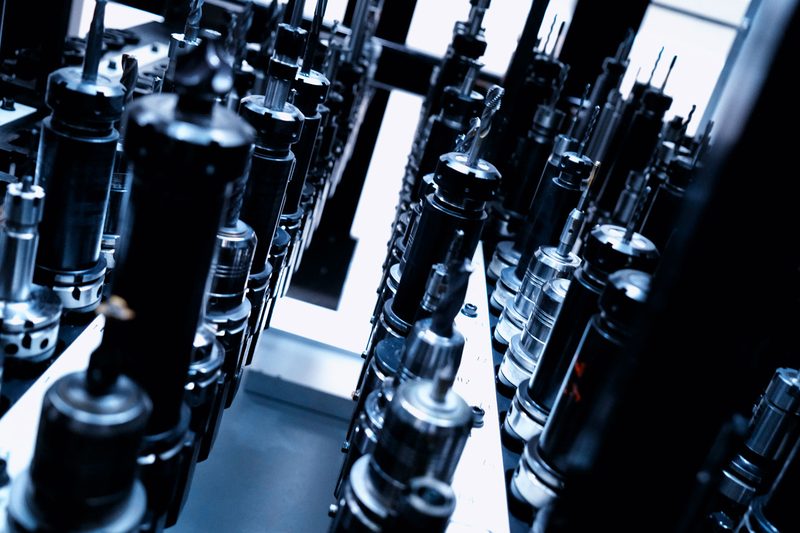 IAMETECH, the workshop — Tool holders lined up in the magazine.