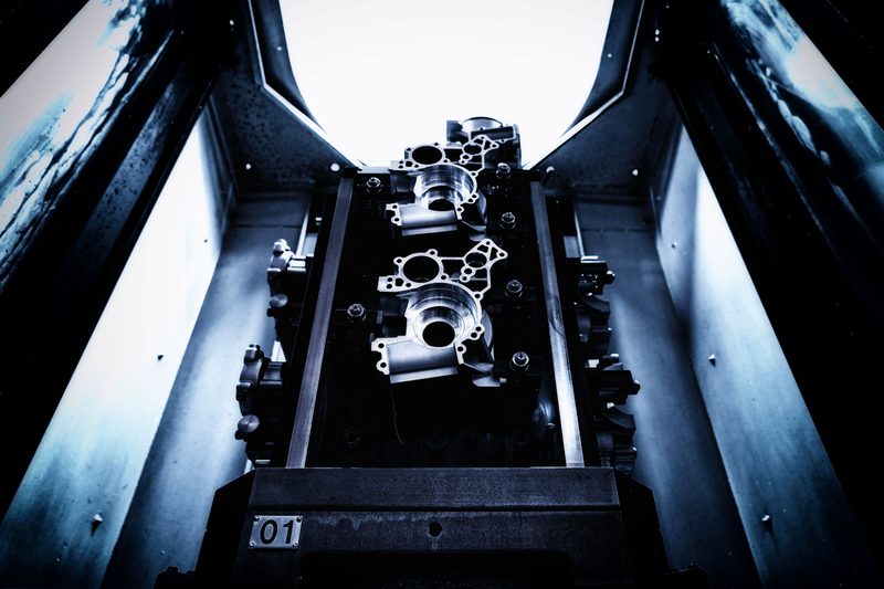 IAMETECH, the workshop — Two crankcases on the pallet, from above.
