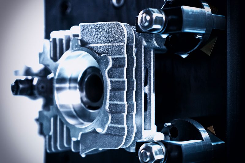 IAMETECH, the workshop — A cylinder clamped on the fixture.
