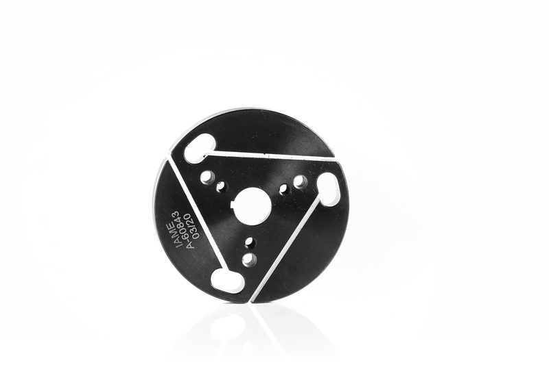 IAMETECH, product still life — A burnished disc, with its engraved code.