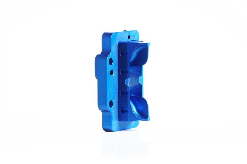 IAMETECH, product still life — A blue anodised reed block.