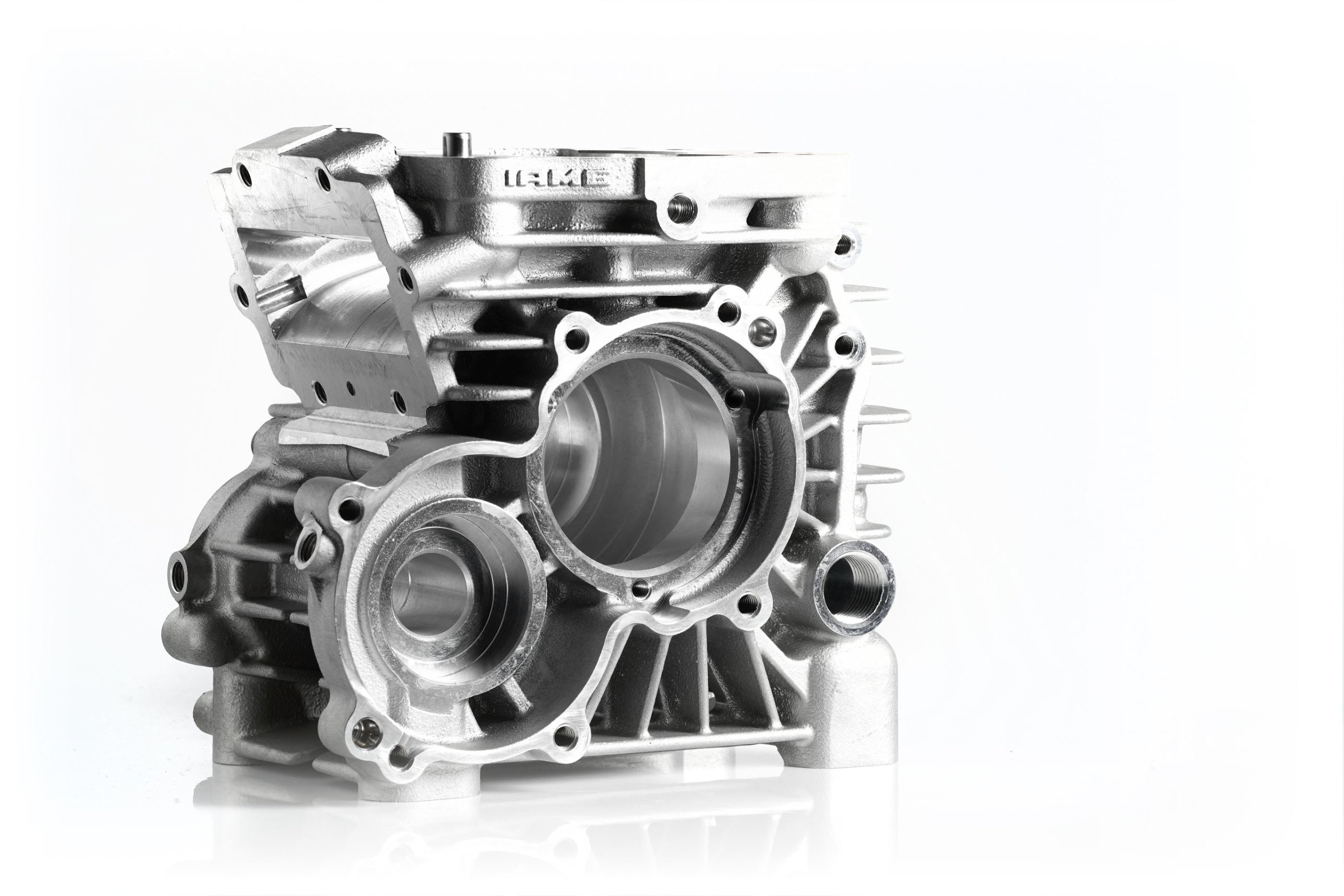 IAMETECH — Still life — An IAME engine casing on a white background.
