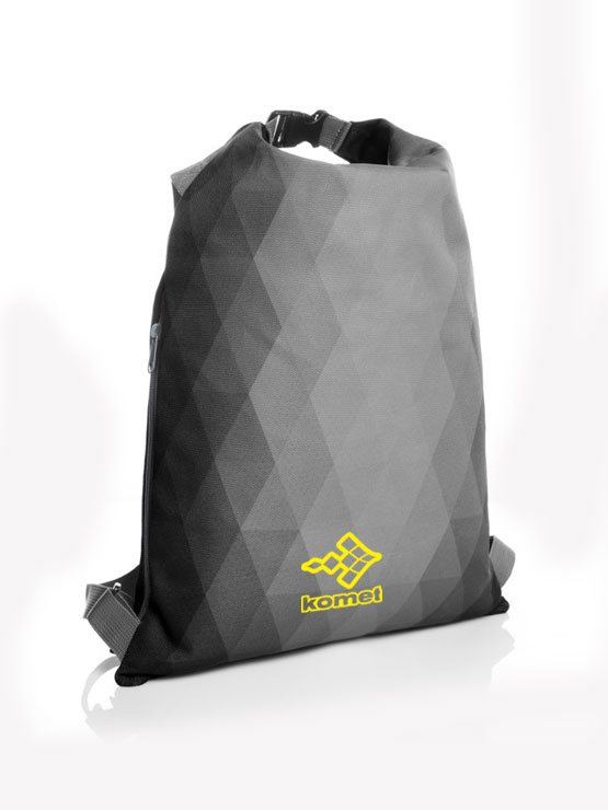 Komet Racing Tyres — Merchandising — Zaino roll-top grigio, con il marchio in giallo.